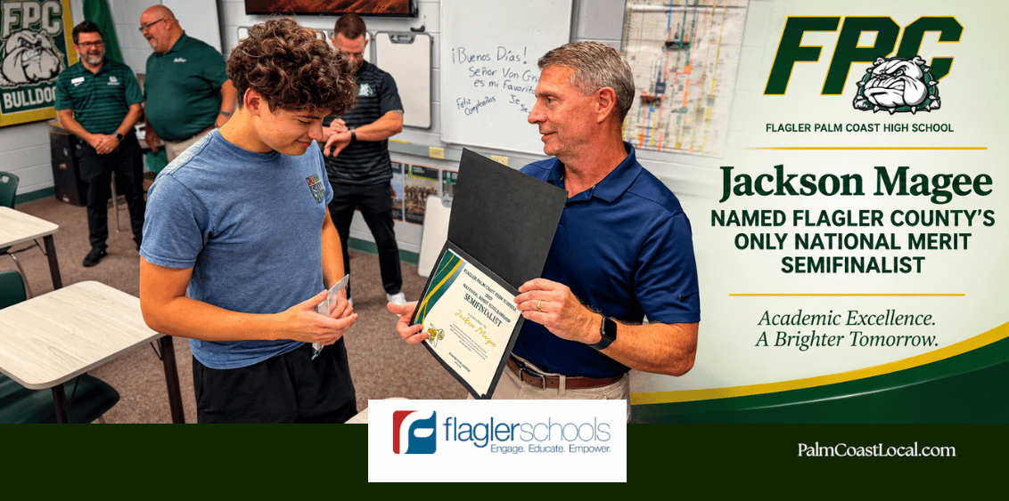 Flagler Palm Coast High School’s Phil DeAugustino presents Jackson Magee with recognition for being named a Semifinalist in the 2027 National Merit Scholarship Program on PalmCoastLocal.com.
